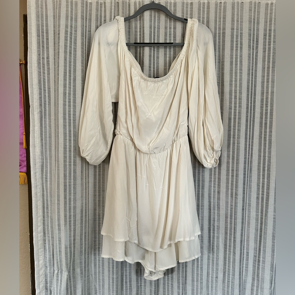 Cream colored flowy romper